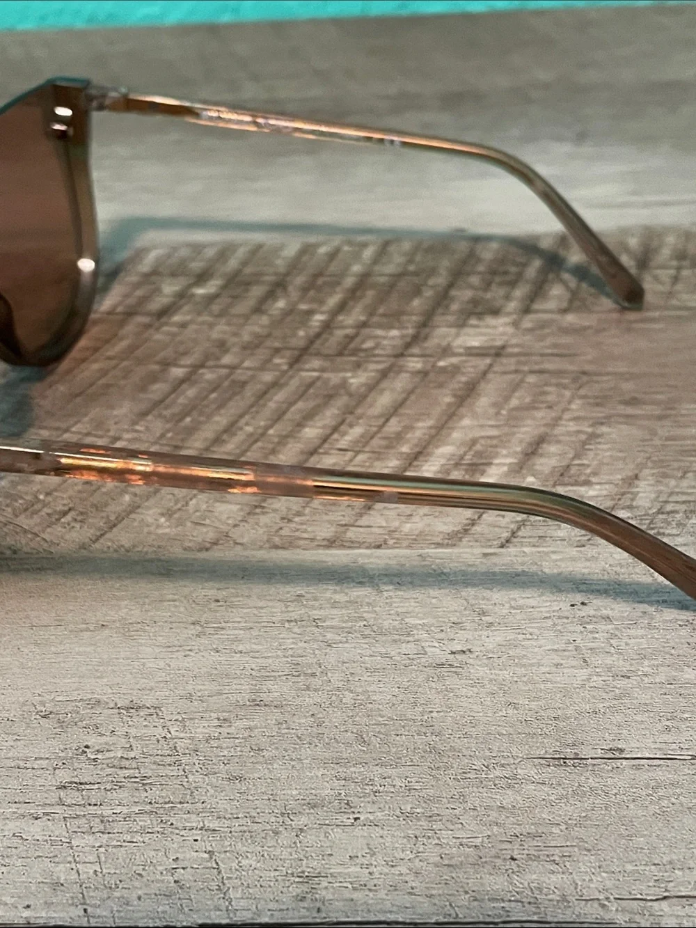Michael Kors Unisex MK2151 Aspen Amber Rimless Shield Sunglasses